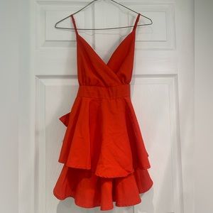 Red dress/Romper that ties at the back
